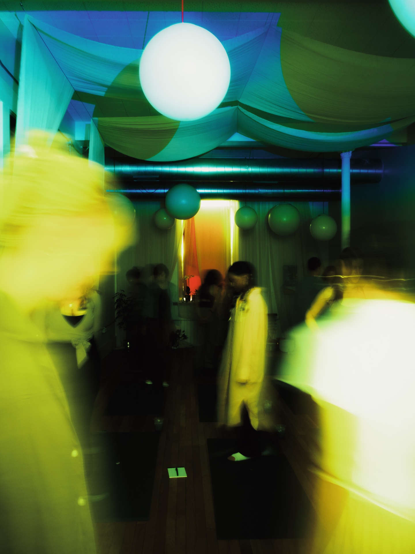 Color-washed studio during ceremony